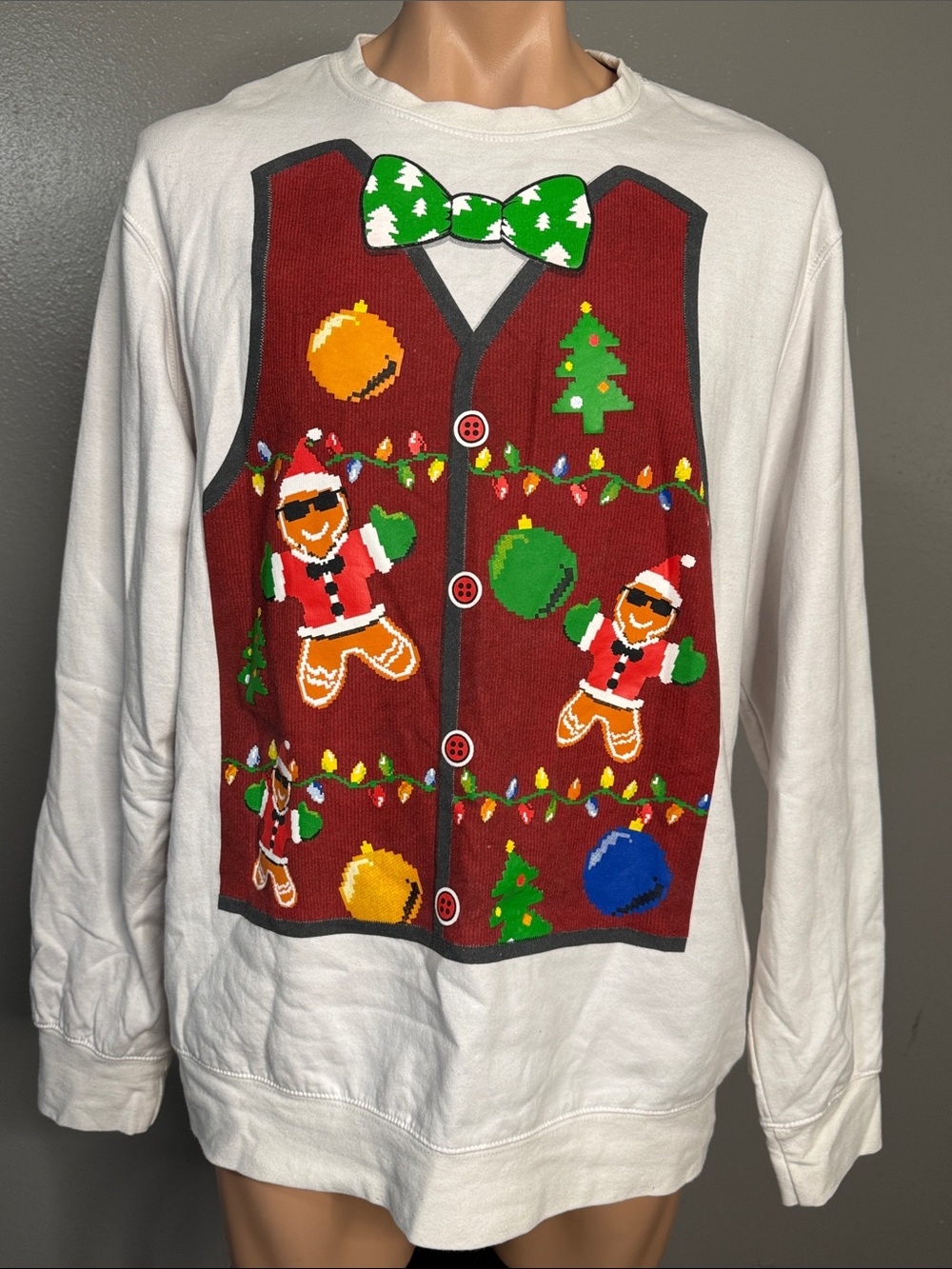 MAD Engine White Crewneck Sweater with Red Vest Graphic and Green Bow